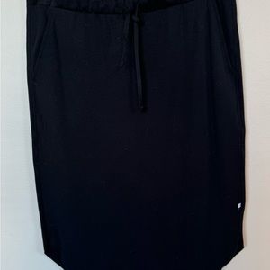 Black skirt by Kit Ace.